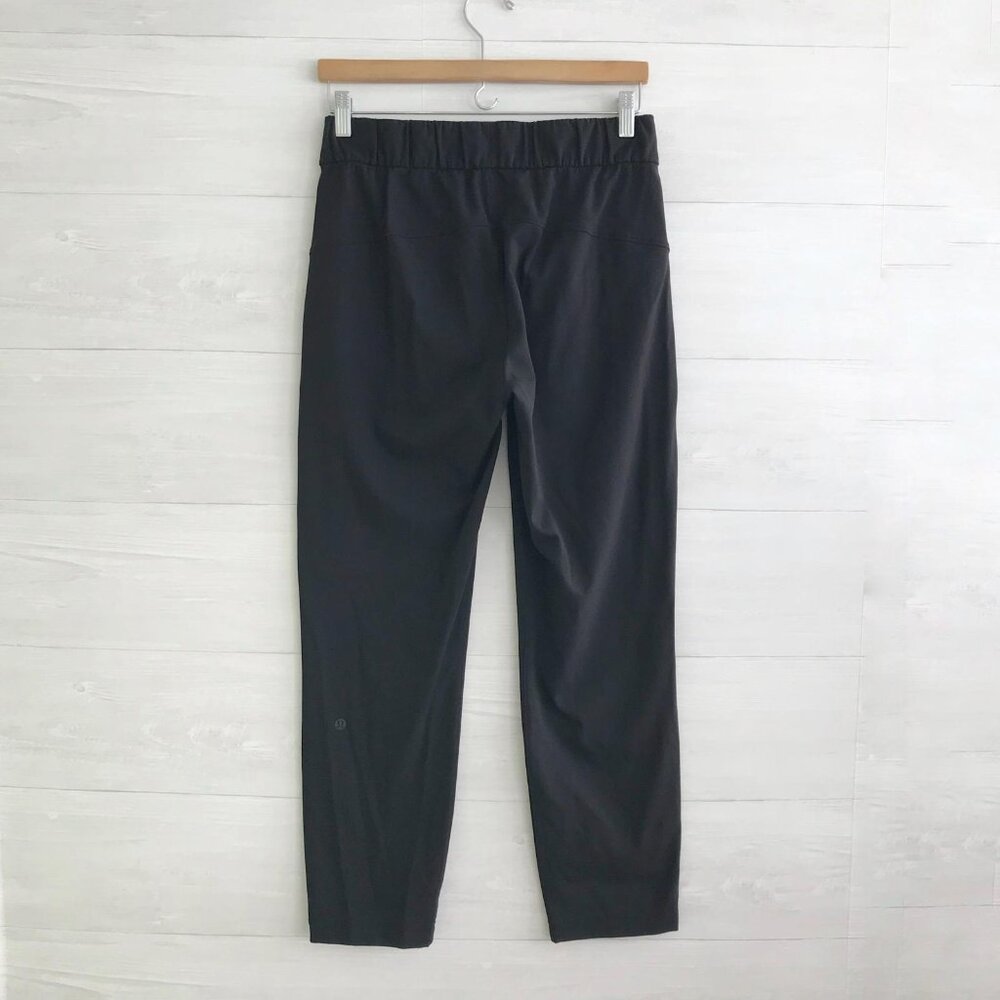 Lululemon - Black On The Fly Pant pull on tapered ankle 28” pants, sz 6 W5ALWS